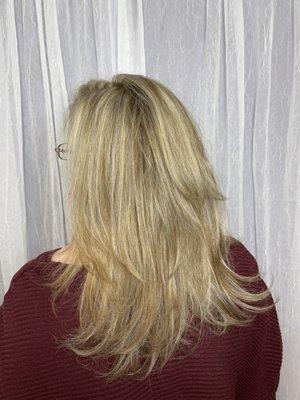 To achieve this beautiful beige blonde, we did a full highlight and lowlight with a gloss and root smudge to blend it all together!