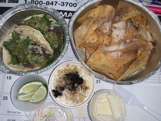 Street tacos with chopped steak, onion, cilantro, lime & salsa! Cinnamon chips! Mexican corn cup!