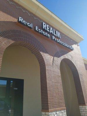 Realm Real Estate office