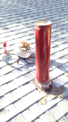 Same chimney that's been sanded, primed, and prepped for a sleeve install