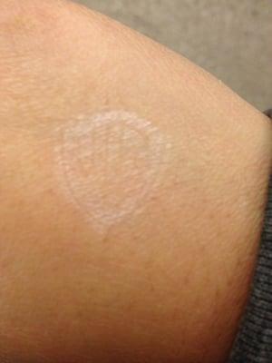 they stamp your hand with a glow-in-the-dark stamp