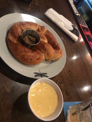 Delicious soft pretzel with excellent dipping cheese. Enjoyed at the bar.