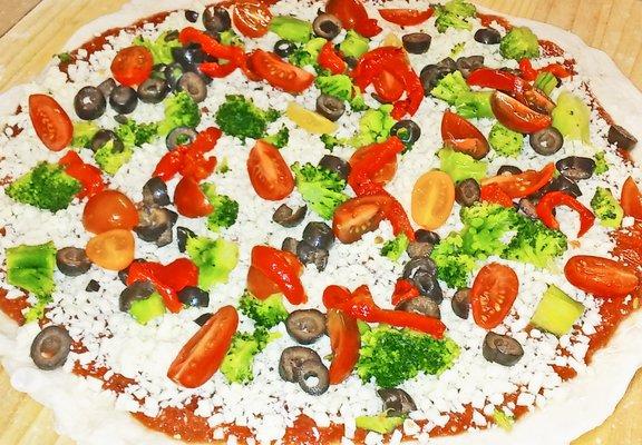 Veggie pizza all ready for the oven