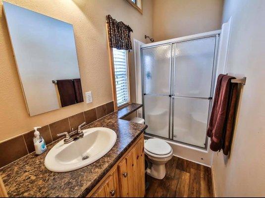 Our bathrooms have full size showers and come with linens.