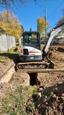 Straddling a trench