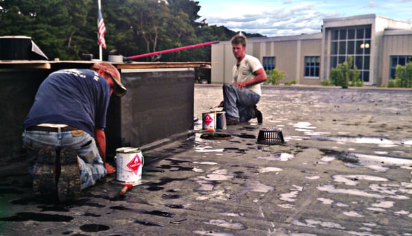 Installing a curb for an HVAC unit on a school near Foxboro, MA.