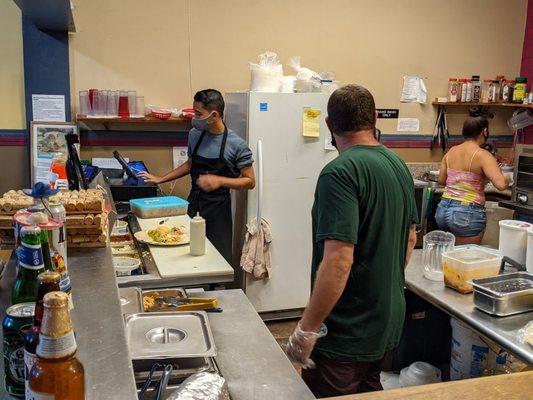 Team Mucho Grande' in the kitchen.