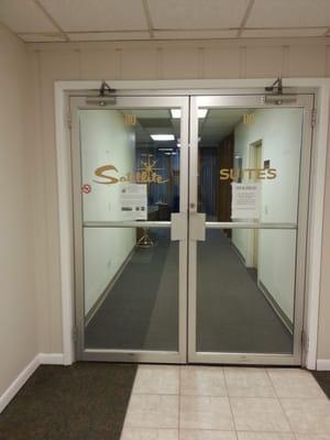 You will go through these double doors when you visit our offices.