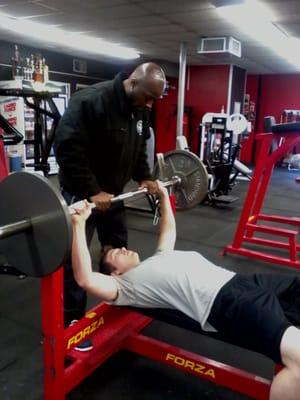 Personal trainer James Lewis with client.