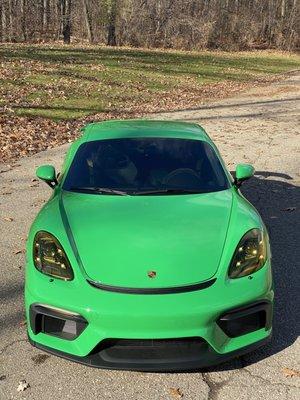 Porsche GT4 In Python green we did Front end PPF removal and reinstalled full vehicle Paint Protection Film, window tint and ceramic coating