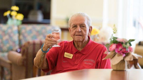 Cheers! Resident Enjoying Happy Hour at Kingston Residence of Marion