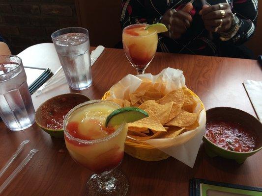 Raspberry margaritas and complimentary chips and salsa