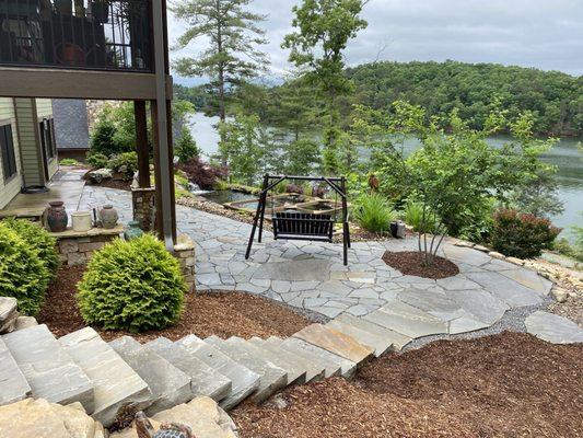 Stone stair case and patio.