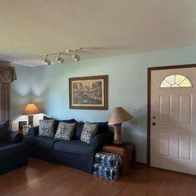 In this family room the ceiling and walls were painted