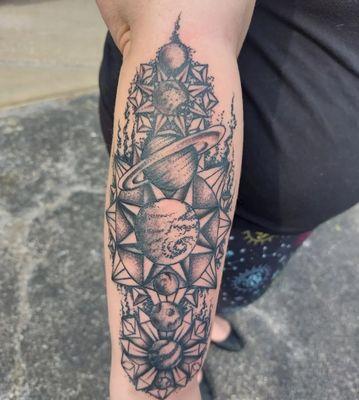 Awesome space and planets tattoo.