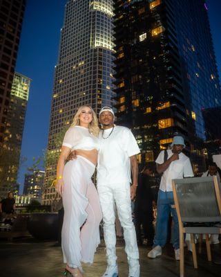 Chic White Party event atop Harbor House in Downtown LA--elegance captured by Always B-Rolling. Book us for your next unforgettable event.