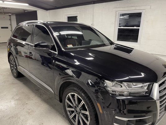 2017 Audi Q7 received front window tints and a windshield strip.