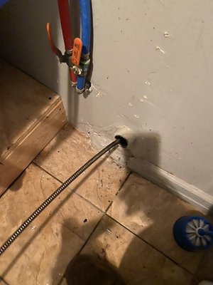 Snaking tub line from clean out in the wall