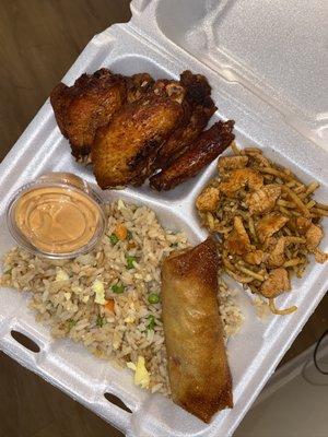 Wings with fried rice, chicken lo mein and a shrimp egg roll