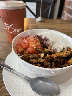 Chicken bowl with rice, veggies, chicken, and a yummy sauce