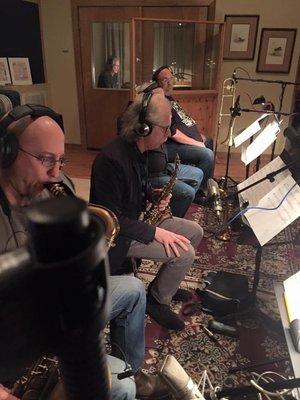 Jeff Coffin, Lou Marini,, Jim Williamson and Roy Agee. Ray Reach behind them and the piano booth.