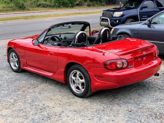 Red convertible Miata