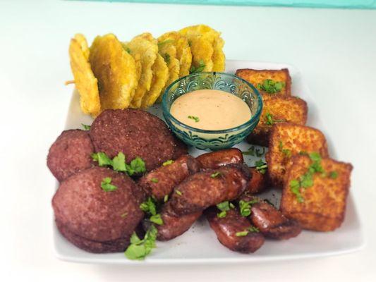 Dominican Picadera
Fried plantains, fried cheese, Dominican sausage and salami