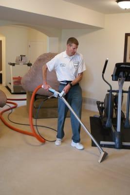 We take pride in all of our work that we perform. Here hot water extraction is being used on a carpet.