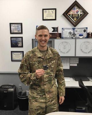 MSgt Gelotte receiving a coin from his commander!