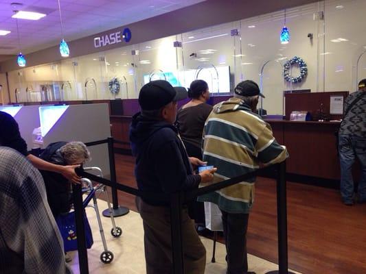 Long line, and only one teller! The future (today) of banking.. Tellers replaced by virtual tellers..Smdh