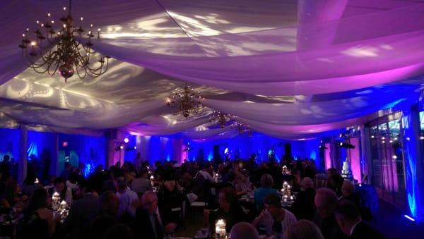 Wedding lighting including a paisley design on the tent canopy, and two-toned uplighting.