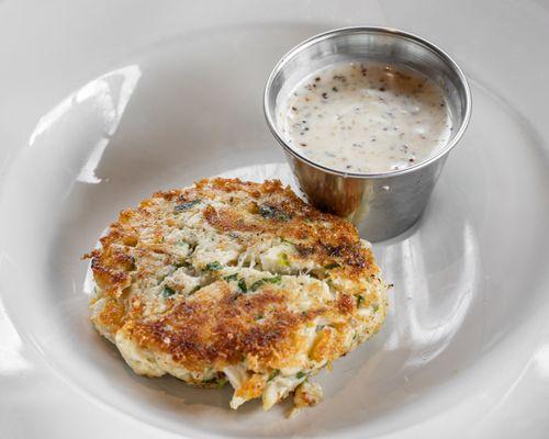 Crab cake served with our homemade whole grain mustard sauce.