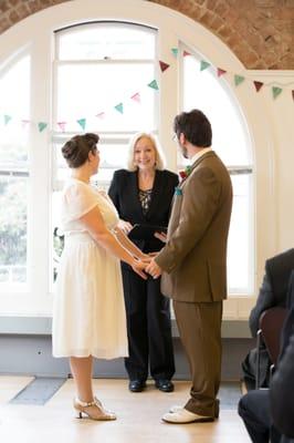 Minister Maggie Officiating our Marriage in Sept 2014