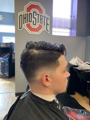 Low bald fade with under cut