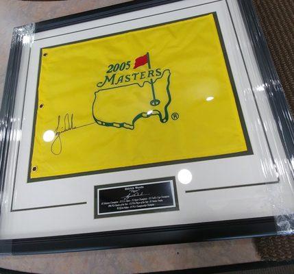 Autographed Master's flag by Tiger Woods.