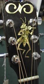 Mother of pearl "Fiddling Grasshopper" inlay by Owen Davidson