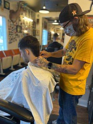 Finishing up a business mullet, textured top and back, finished with a straight razor and hot towel