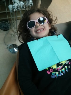 Soo happy to finally see my daughter smiling at the dentist ! Best place ever !