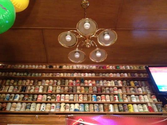 Vintage beer cans lined the bar