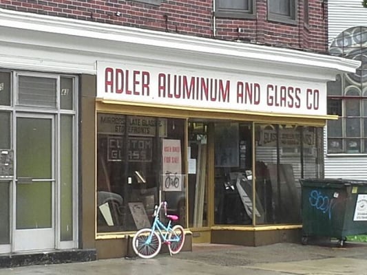 Adler Aluminum & Glass Co. It is located next to Arch Street