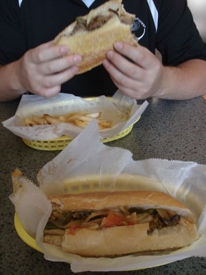 Philly Cheese Steak in back, Veg Philly Cheese sandwich in front