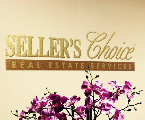 Wall lettering for lobby at Seller's Choice Real Estate, Eugene.