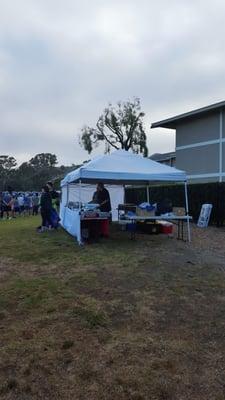 Tacos being prepared. Two free tacos for runners