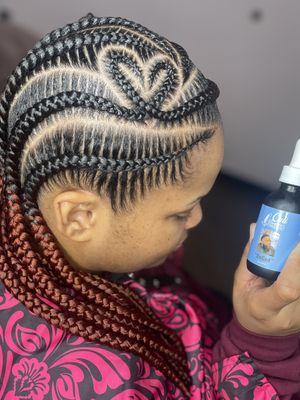 "Braids that define my unique style."  
    CALI