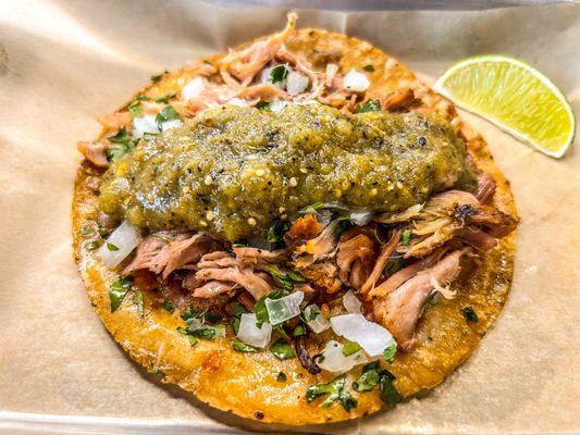 carnitas taco with salsa verde