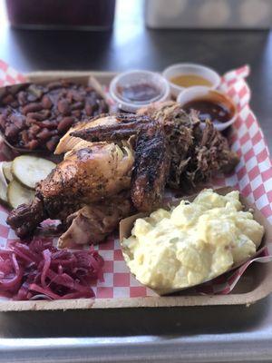 Our 2 meat 2 side platter with chicken, pulled pork, potato salad, baked beans.