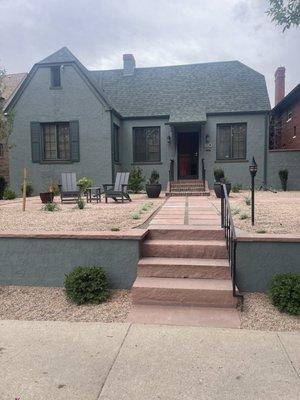 Modern flagstone walkway with patio area