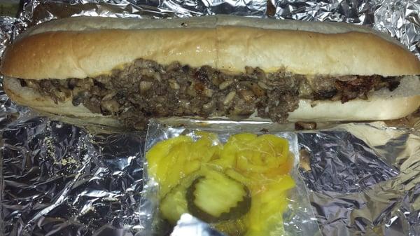 The 12" Steak Bomb.  Comes with side of pickles & banana pepper rings.