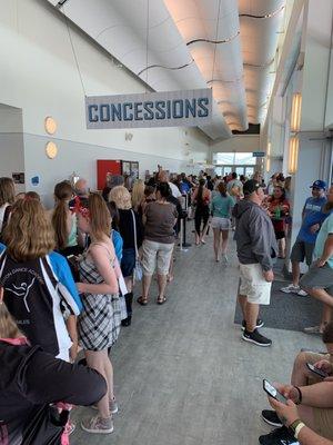 One long line for food at the single concession register.