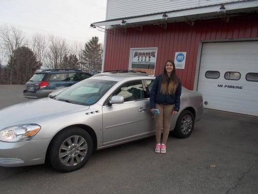 This young lady is very excited about her new wheels that she recently purchased from Adams Automotive...